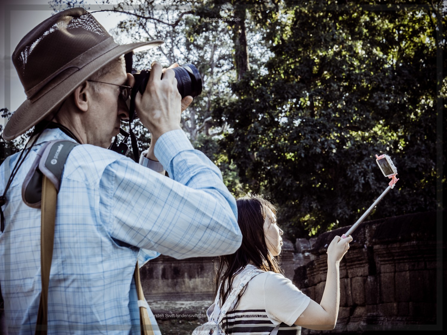  Older generation takes a picture of the place. Younger generation takes a picture of themselves.  