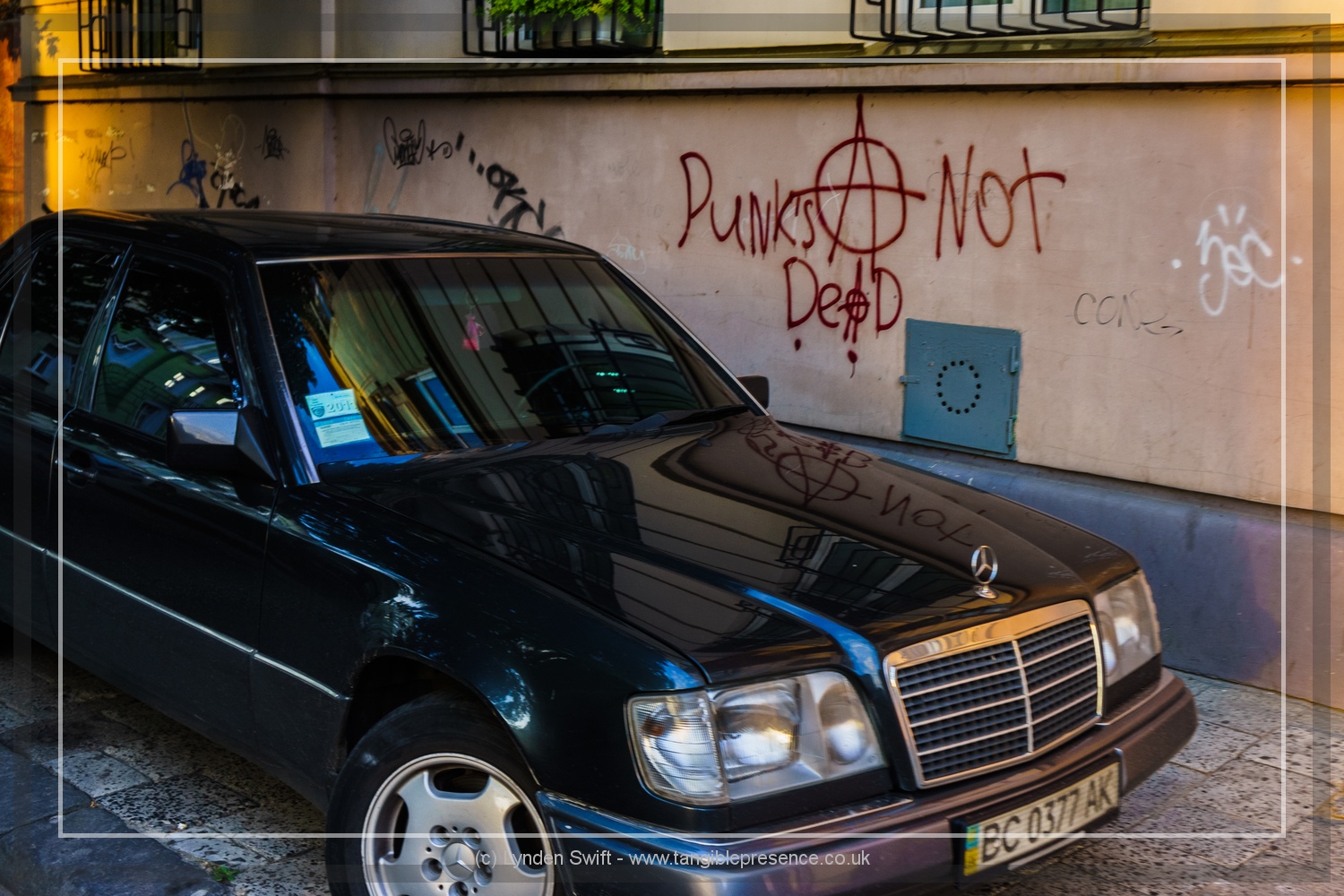  Correctly punctuated Archarcist Grafitti. Lviv. Lynden Swift. Tangible Presence Photography. 